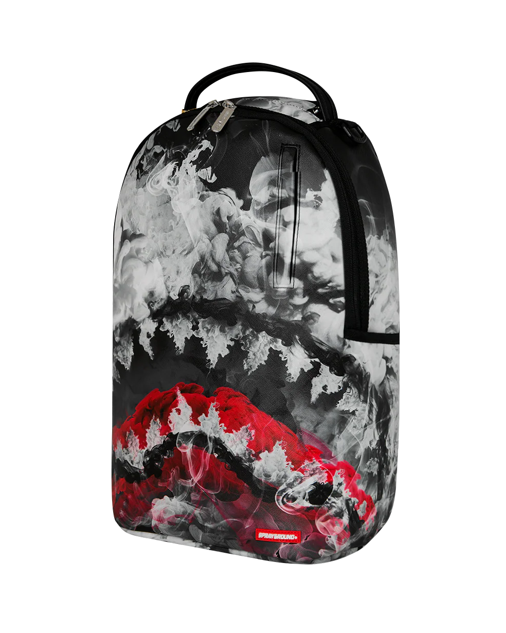 Backpack with black and white abstract design and red accents on a white background