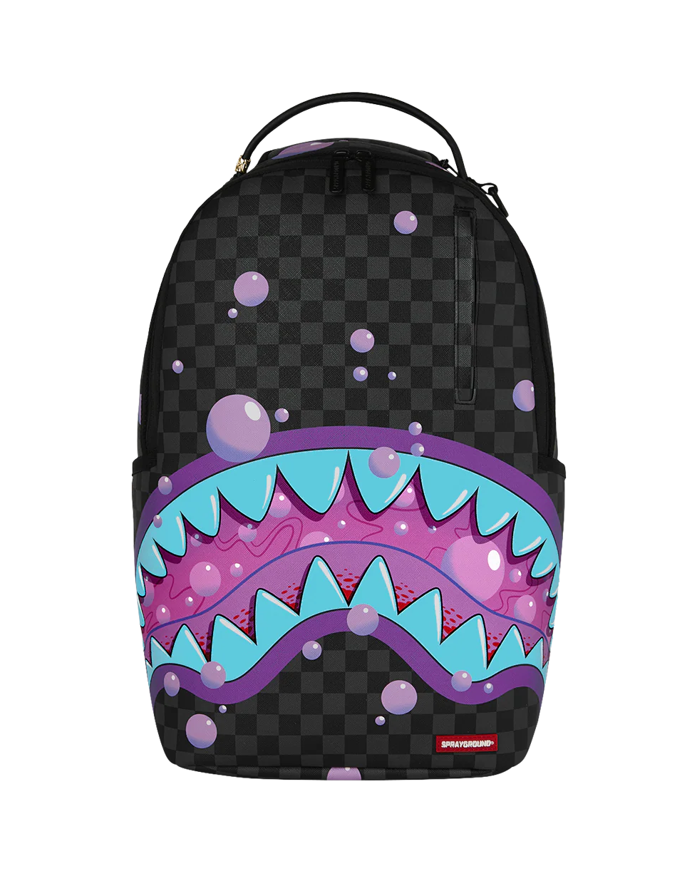 Backpack with shark mouth design on a checkered background